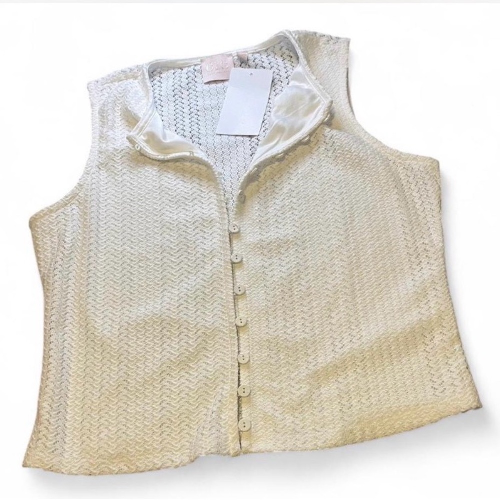 Chic Cream Sleeveless Blouse